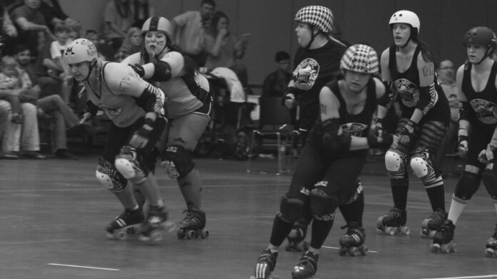 Roller derby athlete eating a light pre-game meal for energy before a bout.